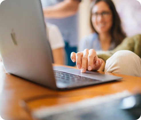 Resident typing on a laptop